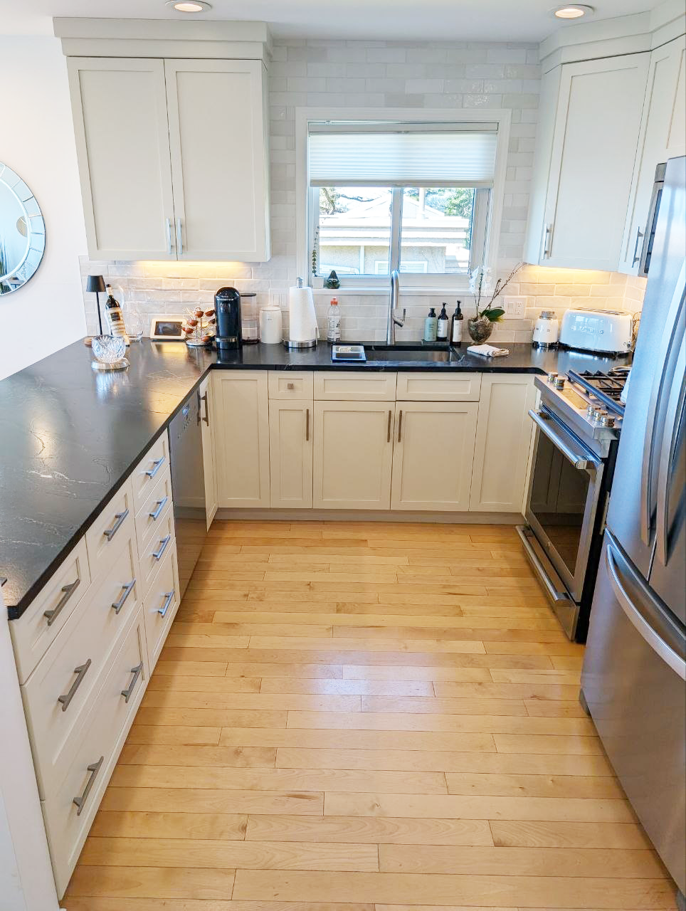 White Rock kitchen — white shaker cabinetry and honed soapstone counters