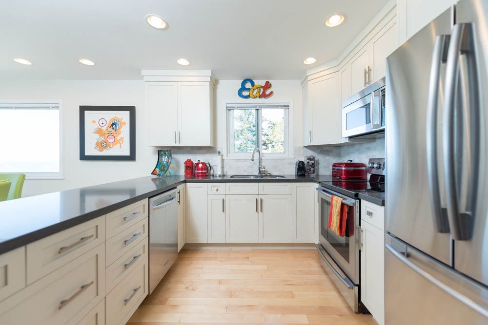 White Rock — existing kitchen with dark counters before renovation