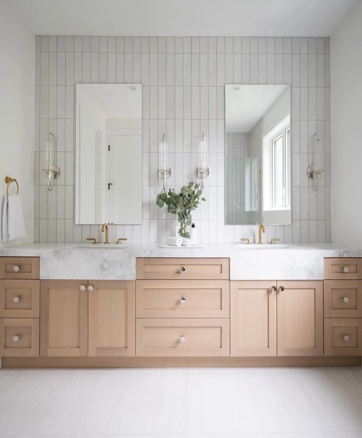 Tsawwassen Residence — primary bathroom with white oak double vanity and tile feature wall